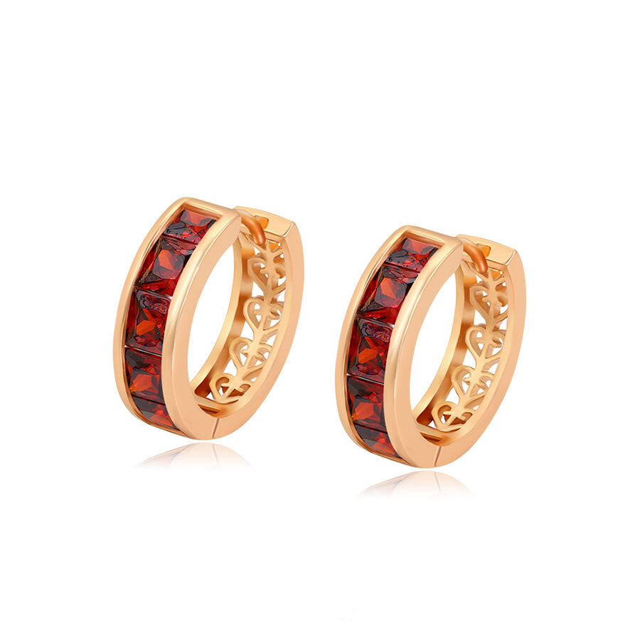 Gold-plated huggie earrings with red crystals - beautiquepoint.com