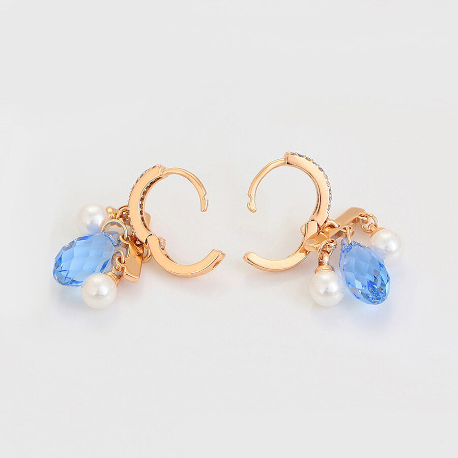 Opened 18k gold-plated earrings with blue drop crystals and gems - beautiquepoint.com